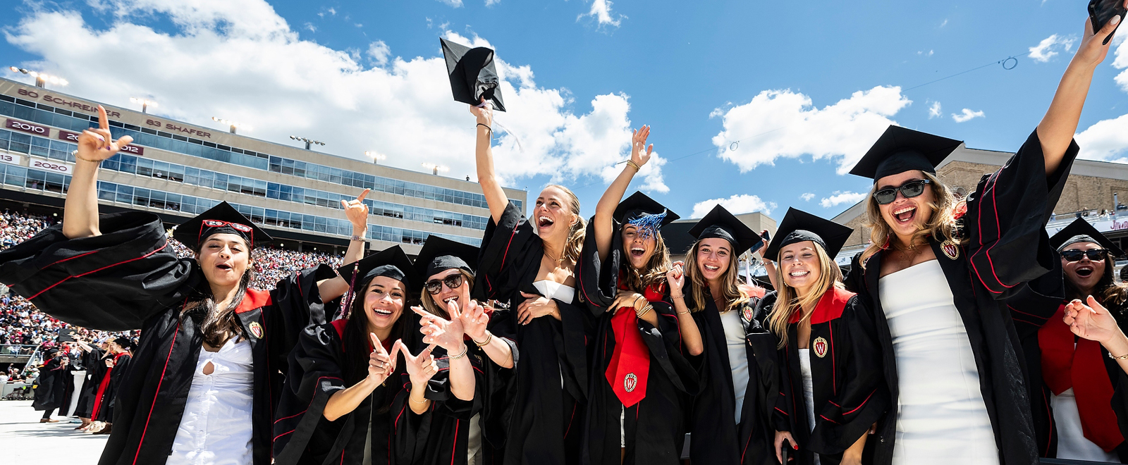 Graduates take part in the tradition of dancing to “Jump Around” during UW–Madison's spring commencement ceremony at Camp Randall Stadium at the University of Wisconsin–Madison on May 11, 2024. 