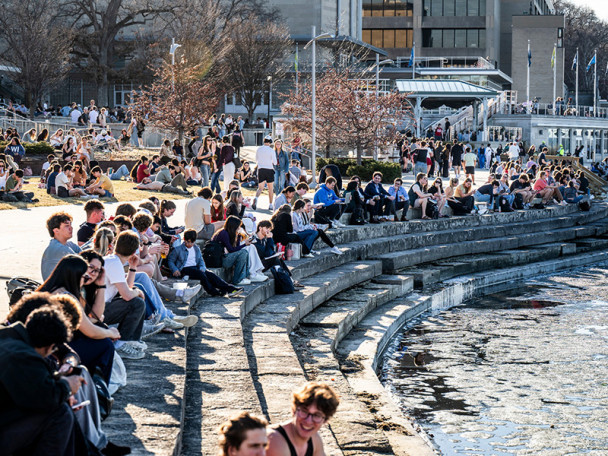 Hundreds of people enjoy the Memorial Union Terrace on a sunny day.