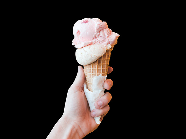 A hand-held ice cream cone.